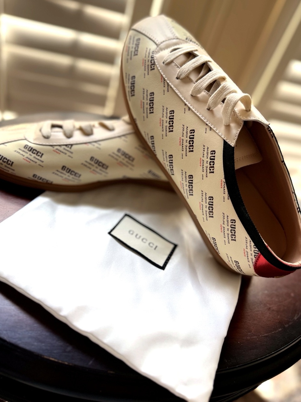 Gucci Falacer sneaker with the “Loved Maison De L’Amour” all over print